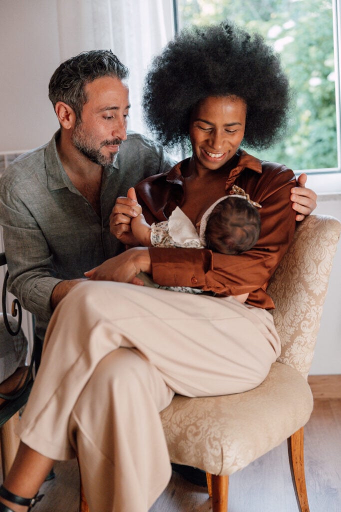 Father with Breastfeeding Mother